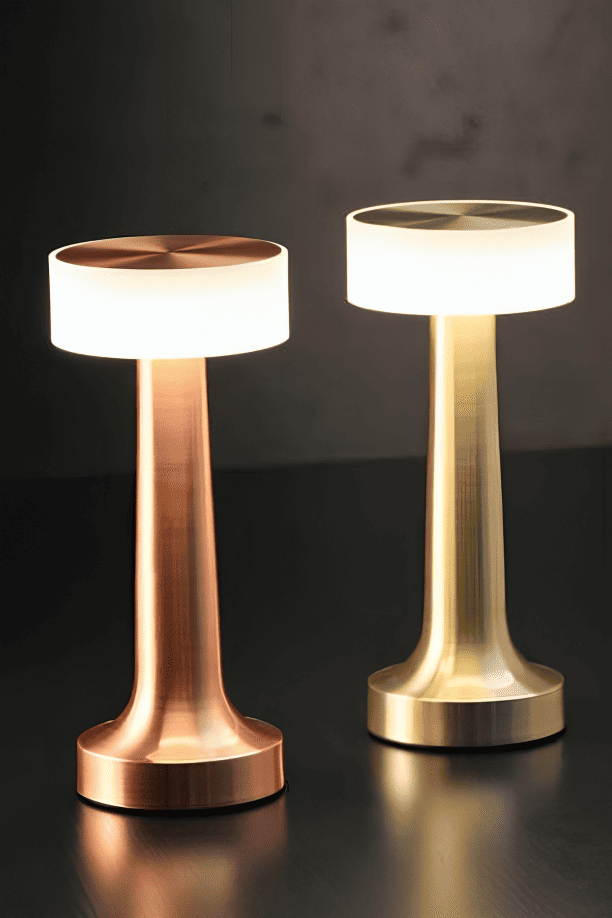 Amberra modern table lamps, one copper and one gold, used in home, restaurants, cafes, office